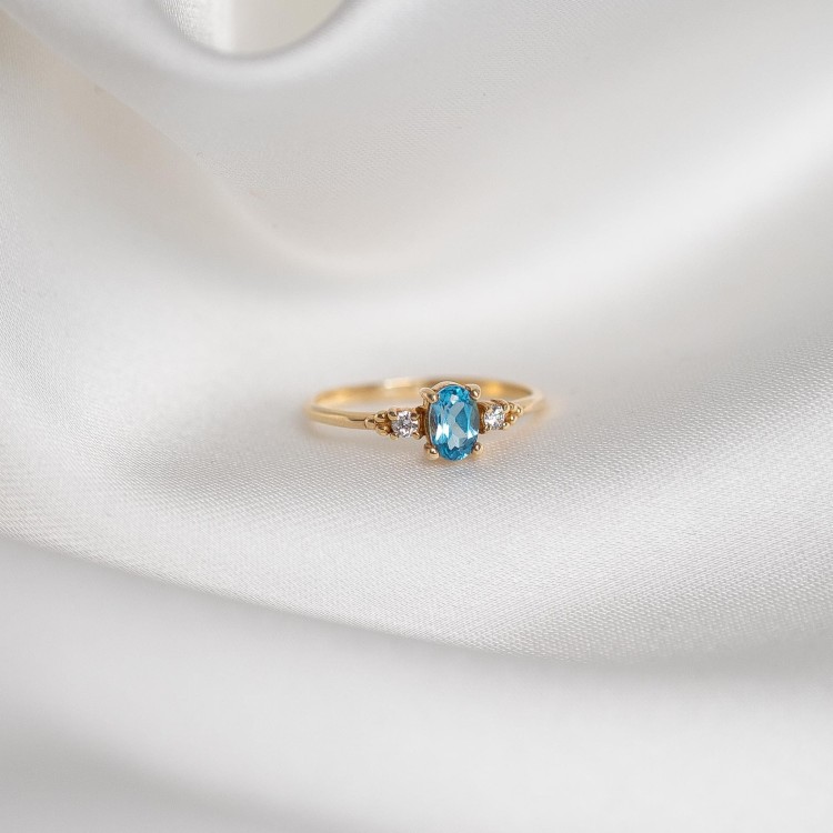 Złoty Pierścionek z Topazem Swiss Blue i Brylantami (id: 1576)